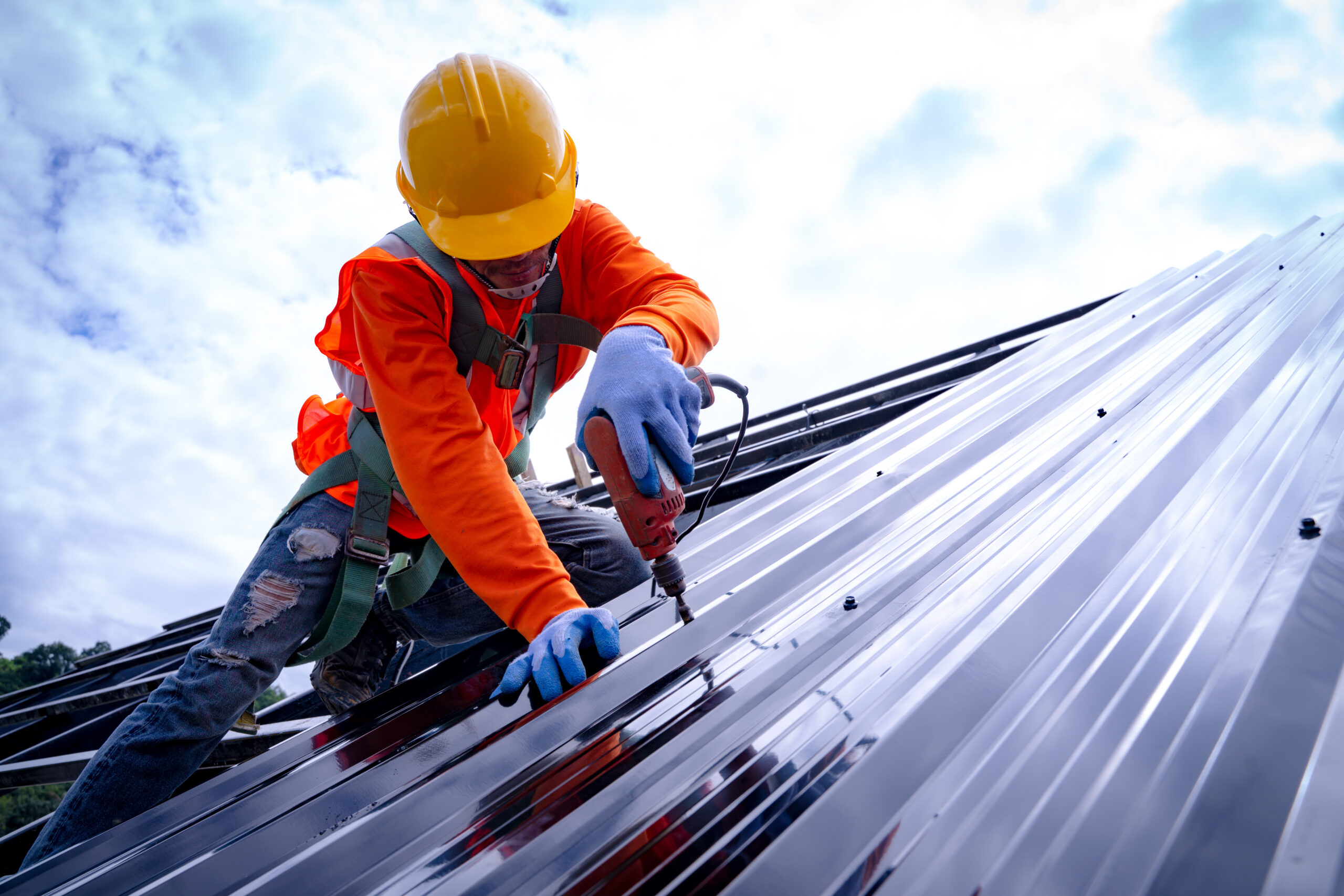 Roofer working on roof