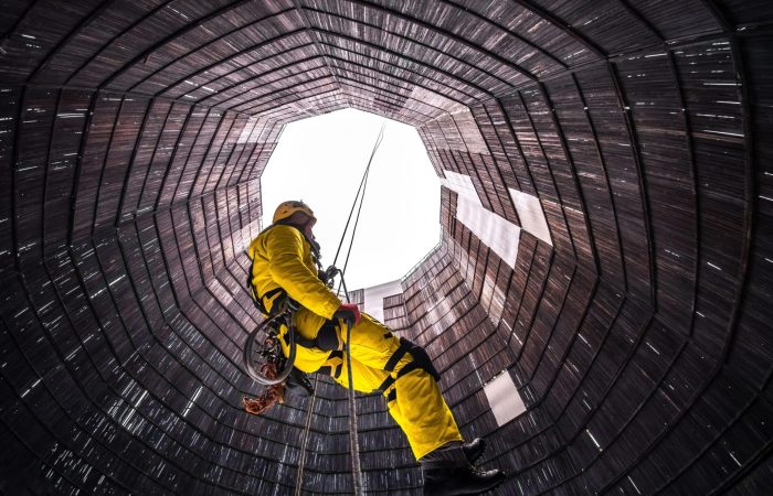 Man descending on rope